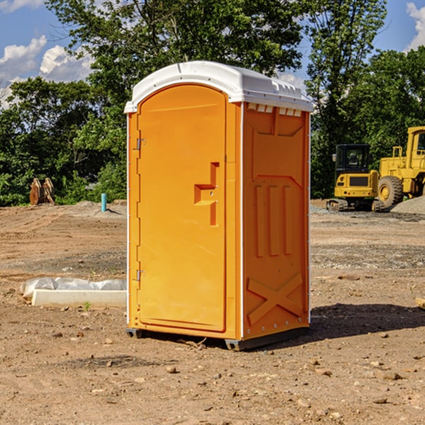 how often are the porta potties cleaned and serviced during a rental period in Hampshire